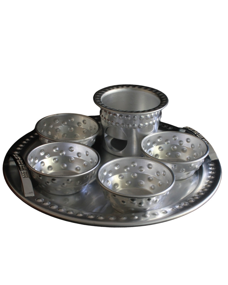 A chocolate set with a warmer