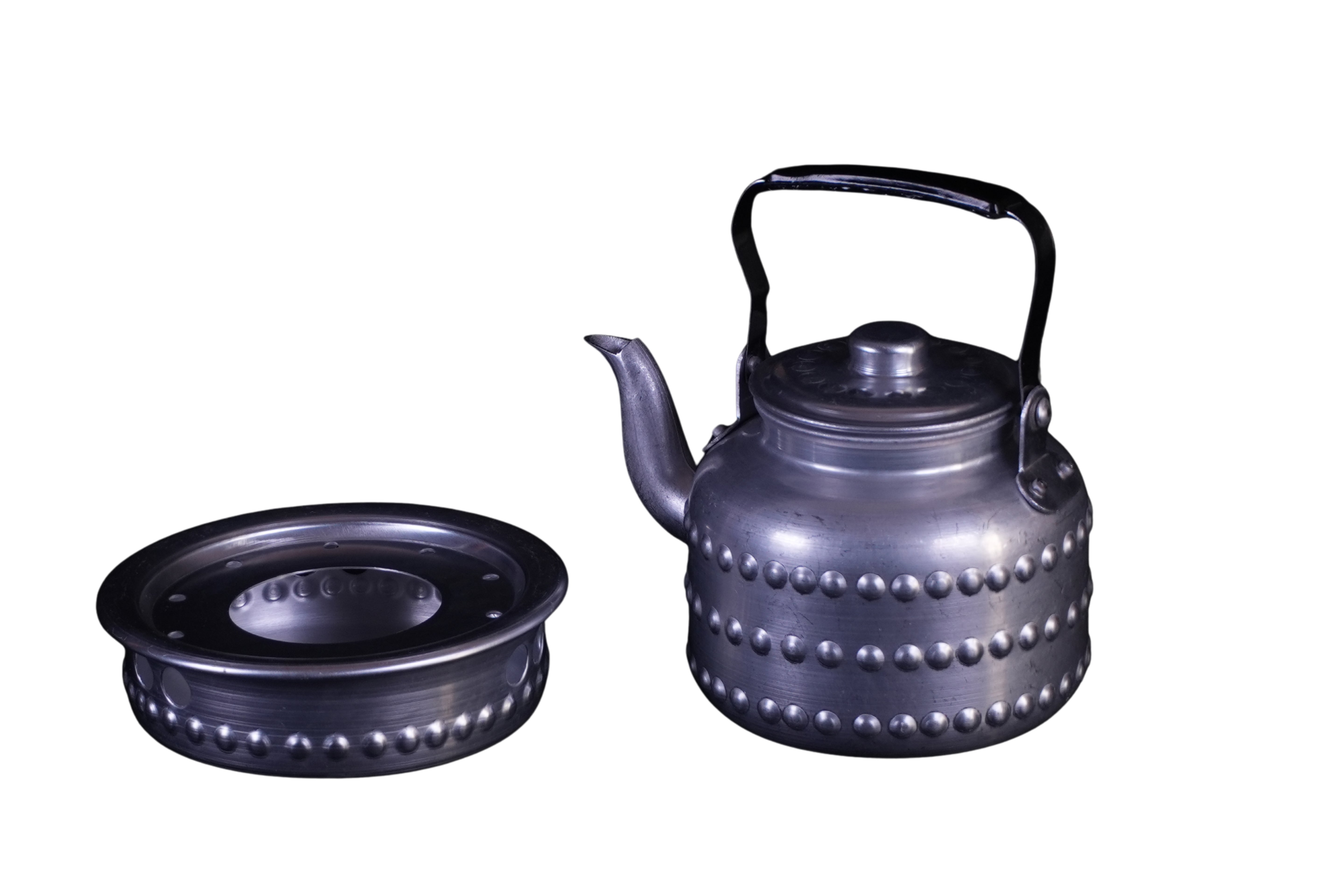 ابريق شاي منقوش مع سخان